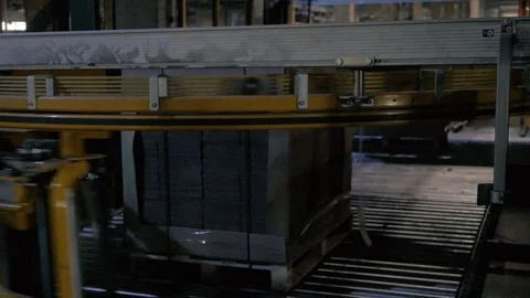 Automatic cellophane wrapping machine Stock Footage 97636363