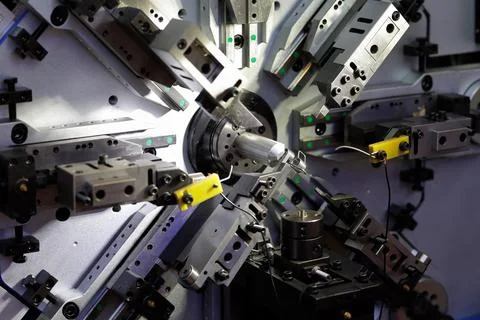 Automatic CNC spring coiling machine close up Foto stock