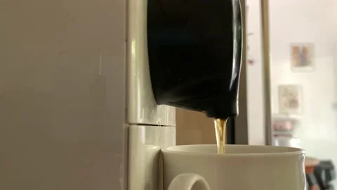 Automatic coffee machine with coffee capsules or coffee pods pouring espresso dr Vídeo Stock 220422694