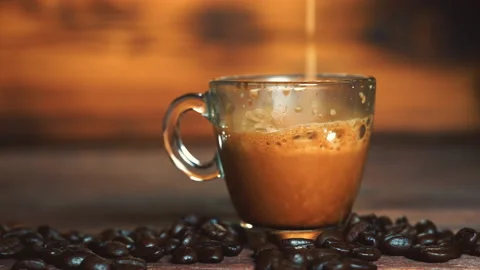 Automatic coffee machine pouring espresso drink in a cup Stock Footage 141764697