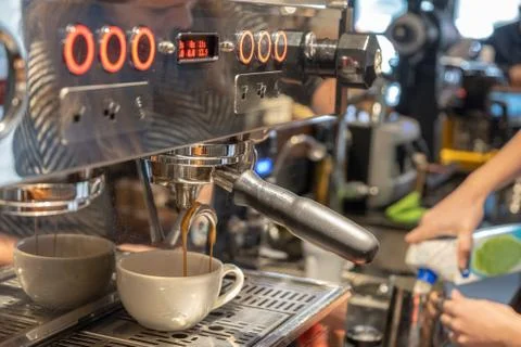 Automatic coffee machine preparing espresso Stock Photos