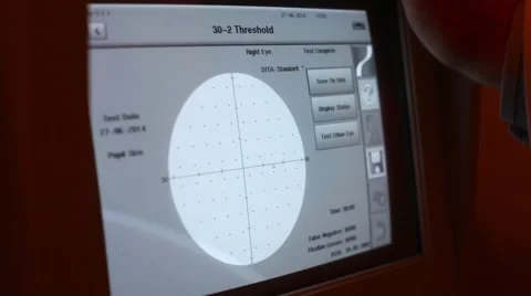 Automatic computer perimeter screen and hand of ophthalmologist. Stock Footage 53229548