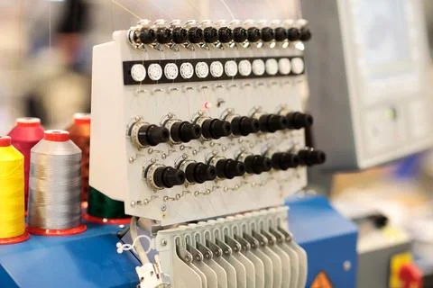 Automatic computerized embroidery machine close up Stock Photos