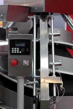 Automatic conical dough rounder machine closeup Stock Photos