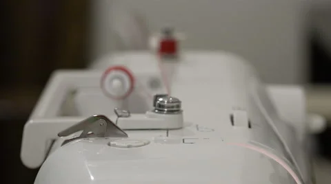 Automatic control of the rewinding of thread sewing machine Stock Footage 67843600