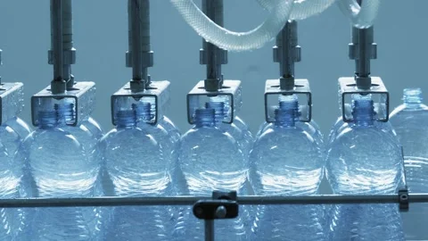 Automatic conveyor line for bottling mineral water in the plastic bottle. Line Stock-Footage 131722940