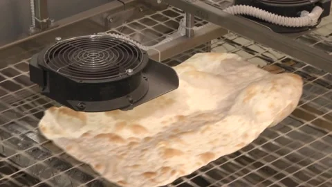 Automatic cooking dough. Stock Footage 105402675