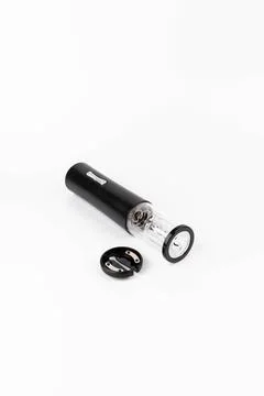 Automatic corkscrew for opening bottle caps. Electric Wine Bottle Opener Stock Photos