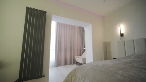 Automatic curtains open in the bedroom Stock Footage 257810880