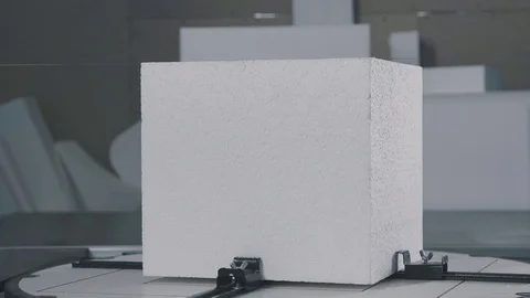 Automatic cutting of expanded polystyrene foam plastic Stock Footage 73938072