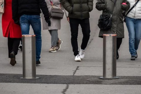 Automatic cylindrical barriers on the pedestrian zone against the background  Foto stock