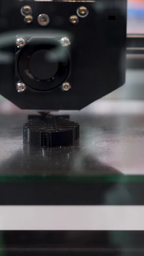 Automatic device 3D printer prints the form of molten plastic. HDR. Close up of Stock Footage 289638785