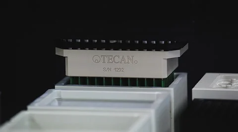 Automatic device raises and test tube with the drug Stock Footage 53067546