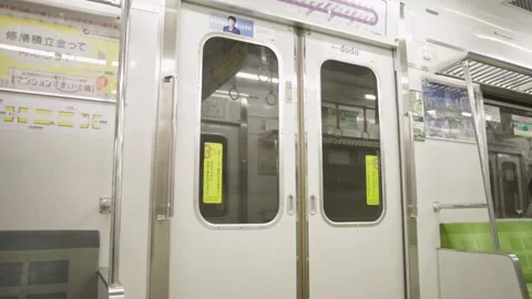 Automatic door inside a moving subway train in Japan. Stock Footage 234159970