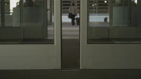 Automatic Door Slides Open For Person To Enter Stock-Footage 118615221