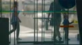 Automatic doors in shopping center, people entering and exiting building 4k or 4k+ Resolution