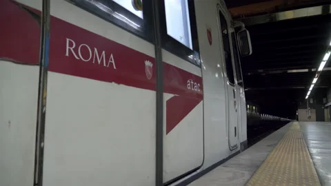 Automatic doors of the subway car are open and a men enters them Stock Footage 155071304