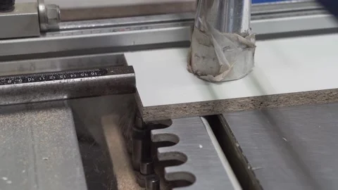 Automatic drilling machine makes a hole in a parts from chipboard. Stock Footage 145992077