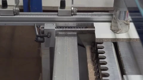 Automatic drilling machine makes a hole in a parts from chipboard. Stock-Footage 145992091