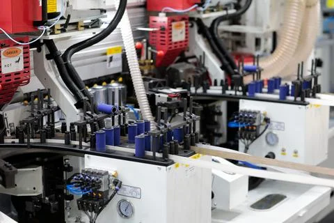 Automatic edge banding machine close up Stock Photos