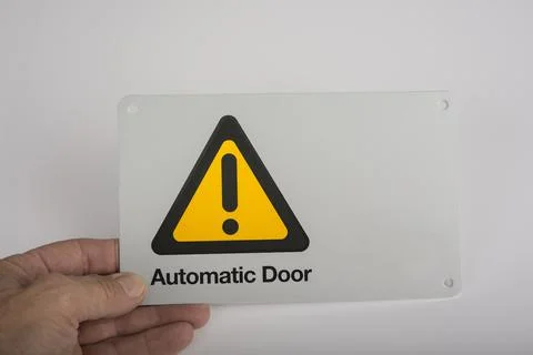 Automatic electric gate opener sign on a white 스톡 사진