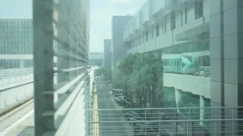 An automatic electric skytrain arriving at the station platform in airport Stock Footage 65886453