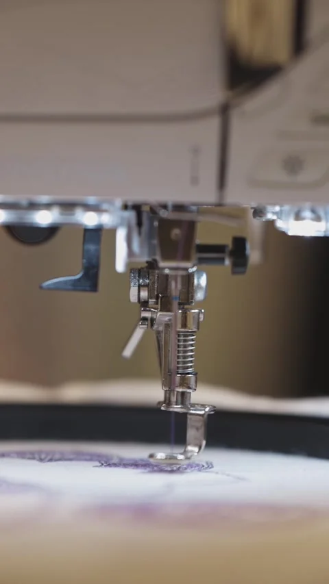 Automatic embroidery on fabric using a machine Stock Footage 329471482