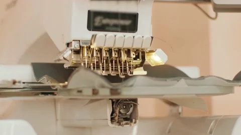 The automatic embroidery machine is working at high speed. Close-up Stock Footage 132319006