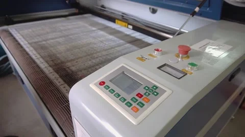 Automatic fabric cutting machine with control panel at plant Stock Footage 236908223