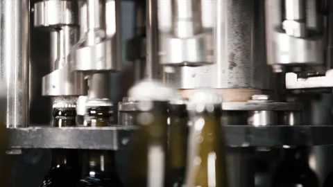  Automatic filling machine pouring beer in a brewery.  Stock Footage 88998289