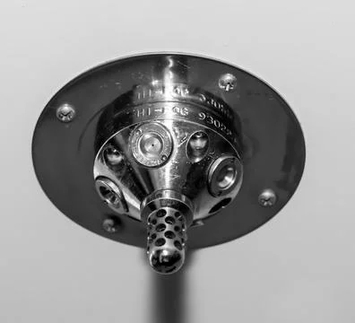 Automatic fire detection and water sprinkler in chrome metal. Stock Photos