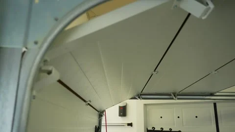 Automatic garage door closing with metal leaf Stock Footage 313535888