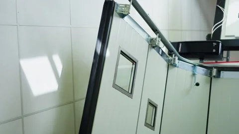 Automatic garage door smoothly closing with intelligent home automation Stock Footage 325570031