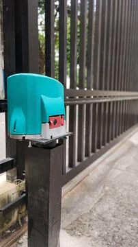 Automatic gate with the gearbox in evidence Stock Photos