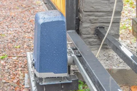 A automatic gate mechanism on the garden plot Fotos de archivo