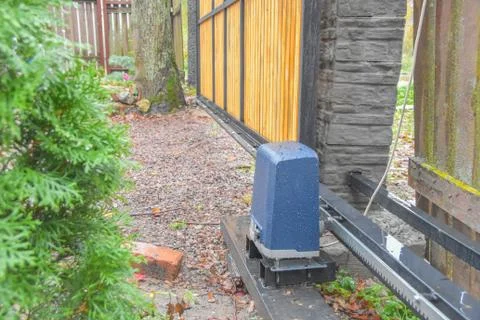 A automatic gate mechanism on the garden plot Fotos de archivo