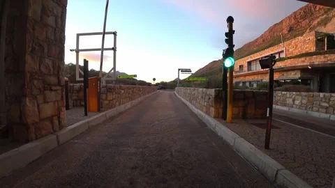 Automatic gate opening at dawn near mountains Vídeos de archivo 302254920