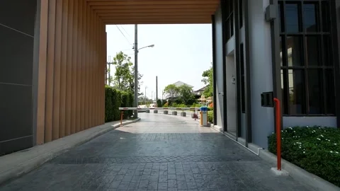 Automatic Gate is slowly opening for Car Parking Lot Stock Footage 138088728