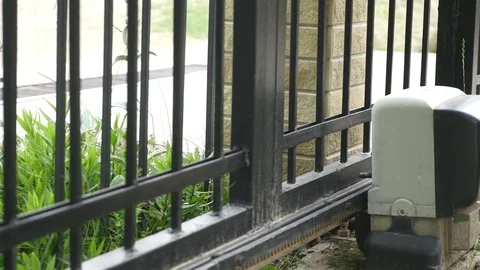 Automatic gates mechanism will open automatically Video stock 77737091