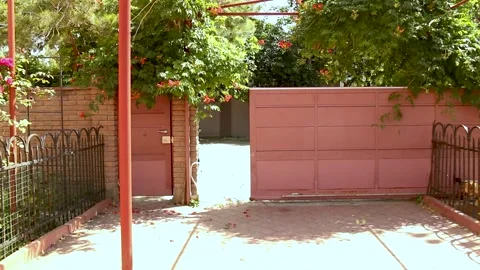 Automatic gates mechanism will open automatically Video stock 142713734