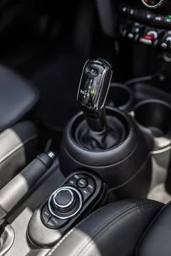 Automatic gear shift lever in car interior Stock Photos