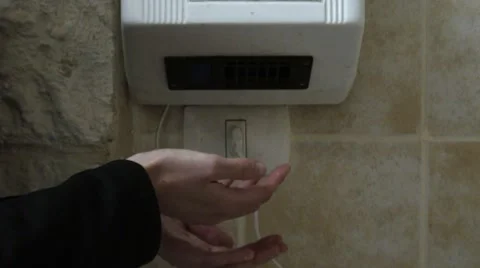 Automatic hand dryer Stock Footage 8760254