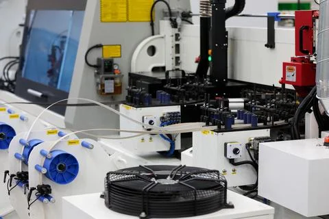 Automatic high speed laser edge banding machine Stock Photos