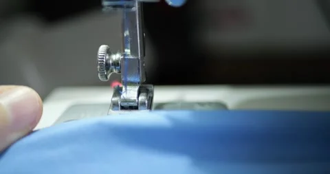 Automatic Home Sewing Machine Presser Foot Pressing Fabric Preparing Material Stock Footage 321807762