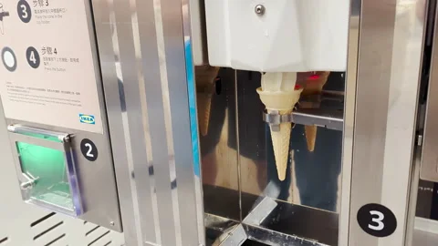 Automatic Ice Cream Machine in Action: DIY Soft Serve at IKEA Restaurant Stock Footage 293469012