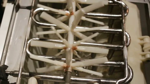 Automatic ice-making plant close-up. The zigzag frost heat exchanger is heated, Stock Footage 129896385