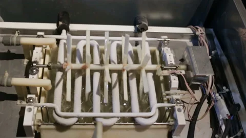 Automatic ice-making plant, view from the top down. The plastic agitator rotates Stock Footage 129896250