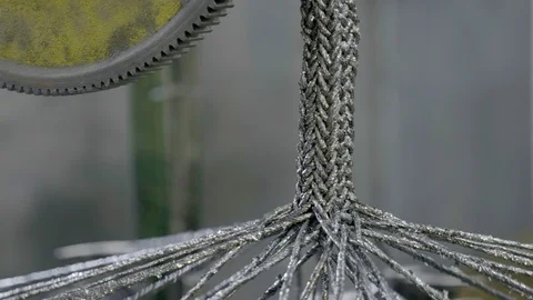 Automatic industrial sewing machine for knitting a braid of non-combustible Stock Footage 126331512