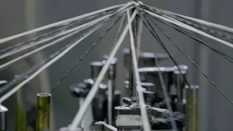 Automatic industrial sewing machine for knitting a braid of non-combustible Stock Footage 126333293