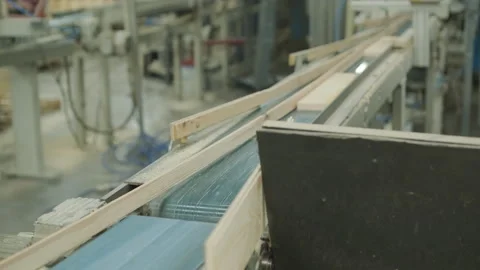 Automatic Industrial Wood Cutting Machine with Feeding Roller Stock Footage 332287509